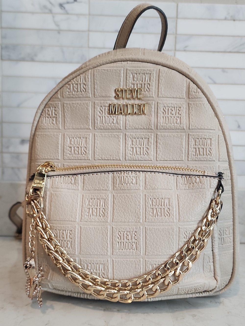 Steve Madden Cream Mini Backpack with Gold Chain Detail